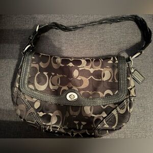 Coach Black Shoulder Bag with Adjustable Straps and Leather Trim